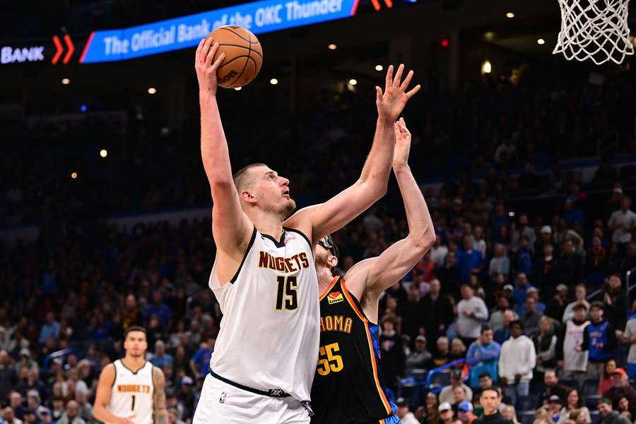 Nuggets' Nikola Jokic going up for a hook shot over Oklahoma City Thunder centre Isaiah Hartenstein (2025)