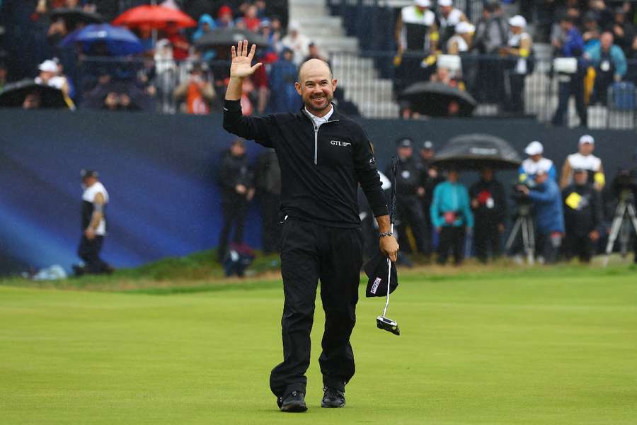 Brian Harman celebrates on the 18th green after winning the 151st Open Championship