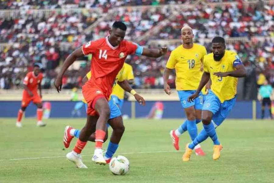 Michael Olunga, left, in action for Kenya against Gabon