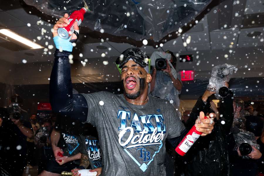 Yandy Diaz celebrating Tampa Bay's series win over New York Yankees.
