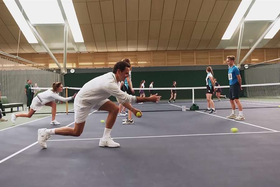 Federer and the Princess of Wales, with some of Wimbledon's ball boys and girls