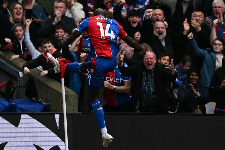 Crystal Palace's French striker #14 Jean-Philippe Mateta celebrates after scoring