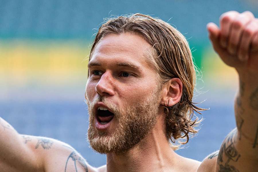 Felix Beijmo celebrating winning the Danish title with AGF 