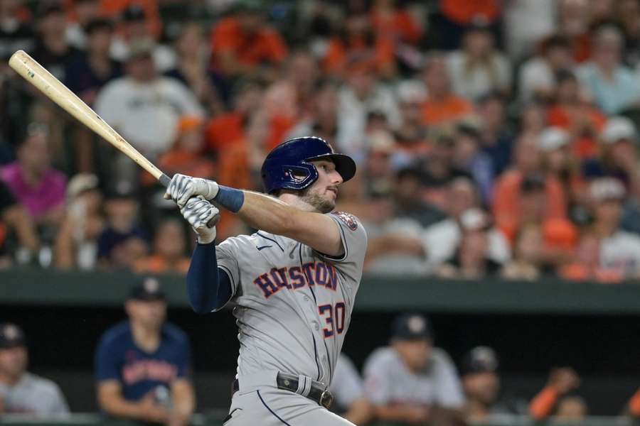 Houston Astros right fielder Kyle Tucker swings through a ninth-inning grand slam against the Baltimore Orioles at Oriole Park