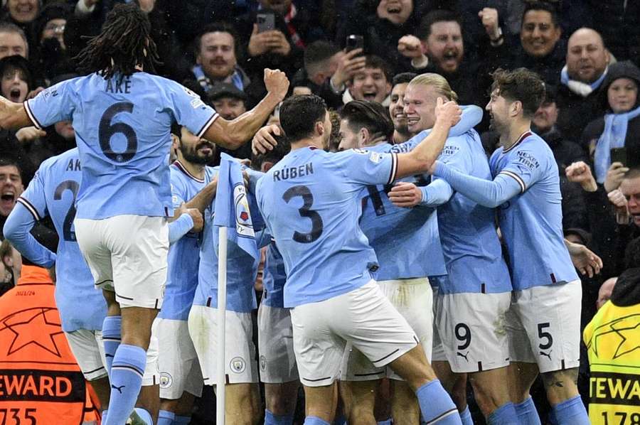 Erling Haaland leads the celebrations as he gives Man City a 2-0 lead in the 24th minute