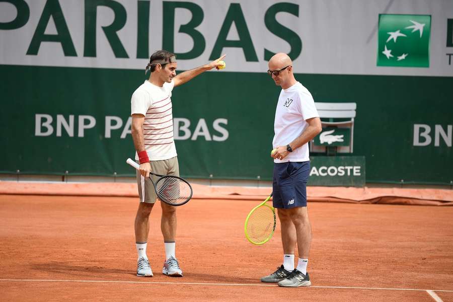 Ivan Ljubicic au côté de Roger Federer à Roland-Garros