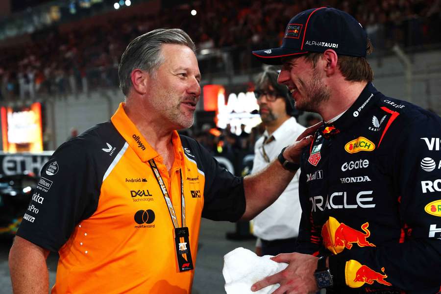 Max Verstappen (R) with McLaren CEO and team principal Zak Brown Max Verstappen (R) with McLaren CEO and team principal Zak Brown