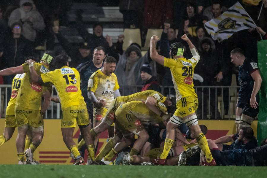 La Rochelles' players celebrate the victorious try during the European Rugby Champions Cup rugby union match 