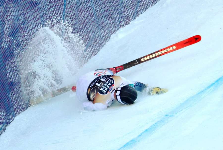 Norway's Aleksander Aamodt Kilde lands heavily on his shoulder after crashing out of the downhill race in Wengen
