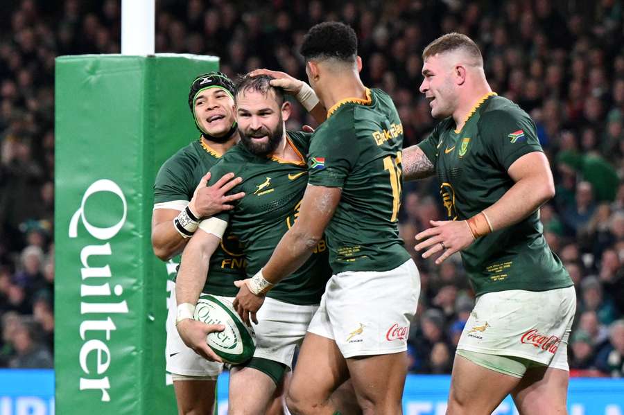 Cobus Reinach celebrates scoring South Africa's second try with teammates Cheslin Kolbe, Damian Willemse and Jasper Wiese Cobus Reinach celebrates scoring South Africa's second try with teammates Cheslin Kolbe, Damian Willemse and Jasper Wiese