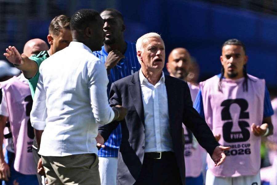 Pape Thiaw and Didier Deschamps shake hands after the game Pape Thiaw and Didier Deschamps shake hands after the game