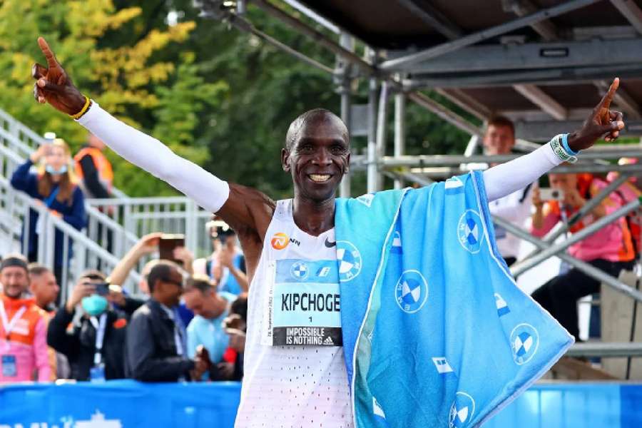 Kipchoge celebrates after winning the Berlin Marathon and breaking the world record