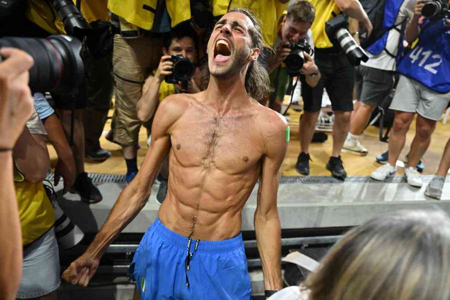 Gianmarco Tamberi celebrates winning gold in the men's high jump