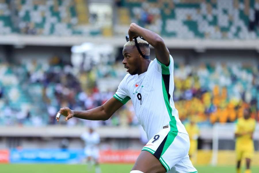 Osimhen celebrates scoring against Benin
