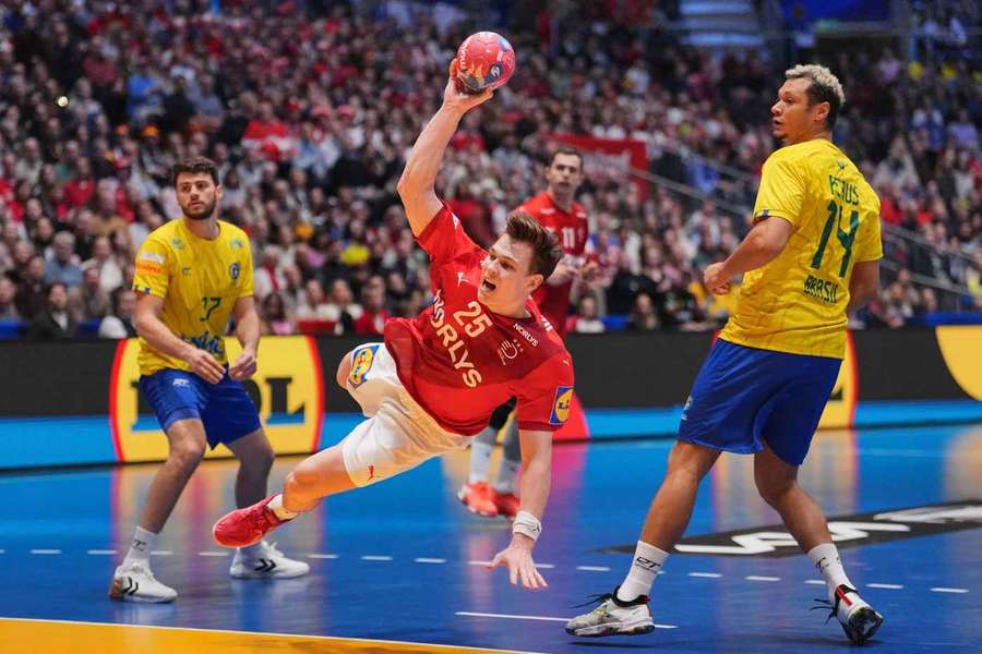 Lukas Jørgensen takes on Brazil's Haniel Langaro in the World Cup quarterfinal