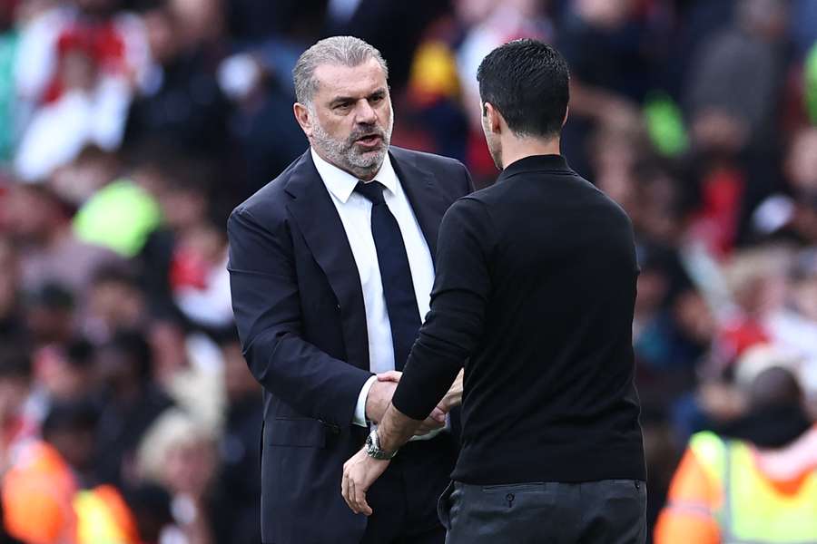 Ange Postecoglou shakes hands with Mikel Arteta after Spurs' 2-2 draw against north London rivals Arsenal on Sunday