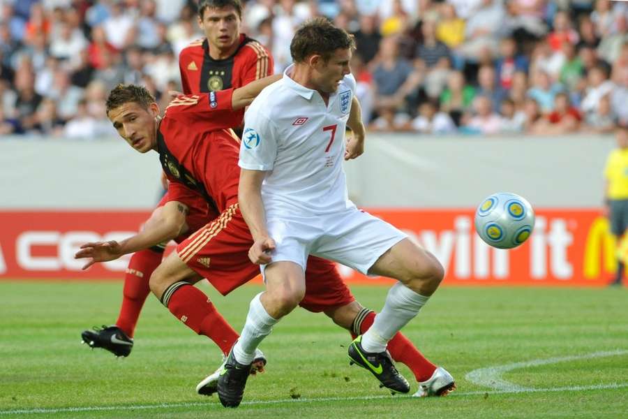 England U21's James Milner looks to control the ball during the final against Germany