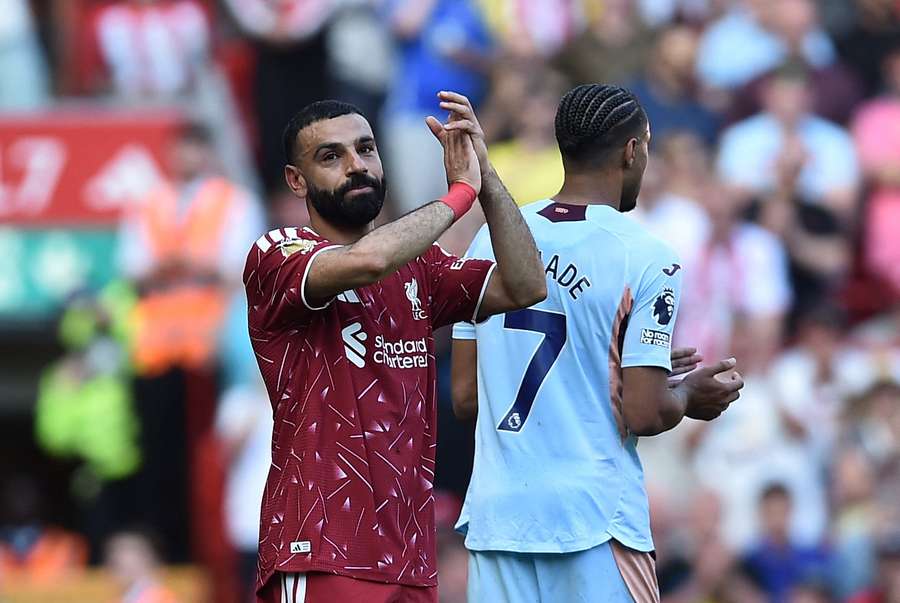 Liverpool's Mohamed Salah applauds their fans as he walks off the pitch after being substituted Liverpool's Mohamed Salah applauds their fans as he walks off the pitch after being substituted