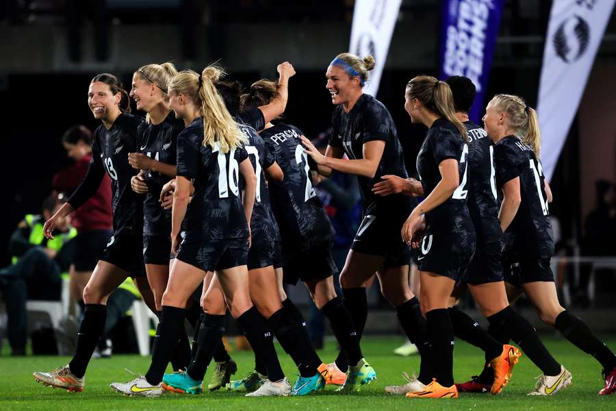 New Zealand players celebrate a goal during the friendly football match between New Zealand and Vietnam ahead of the Women's World Cup