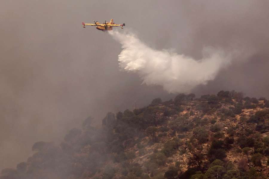 A Canadair firefighting aircraft fights a wildfire burning near Pelayos de la Presa, 65 kilometers west of Madrid A Canadair firefighting aircraft fights a wildfire burning near Pelayos de la Presa, 65 kilometers west of Madrid