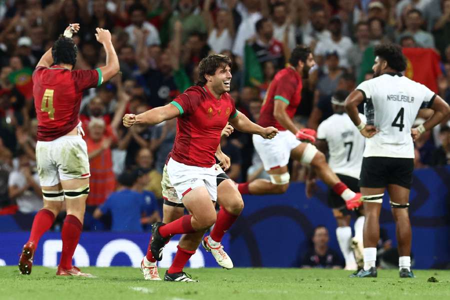 Portugal celebrate their first win