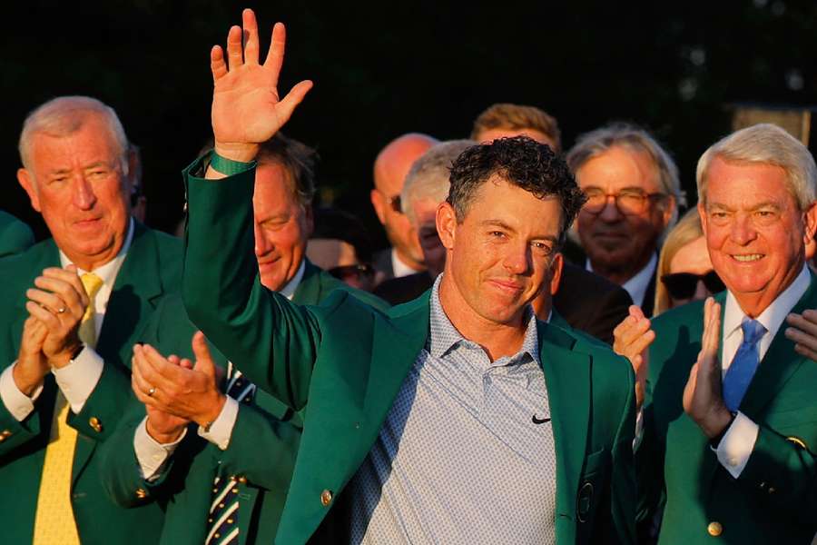 Rory McIlroy celebrates winning the Green Jacket