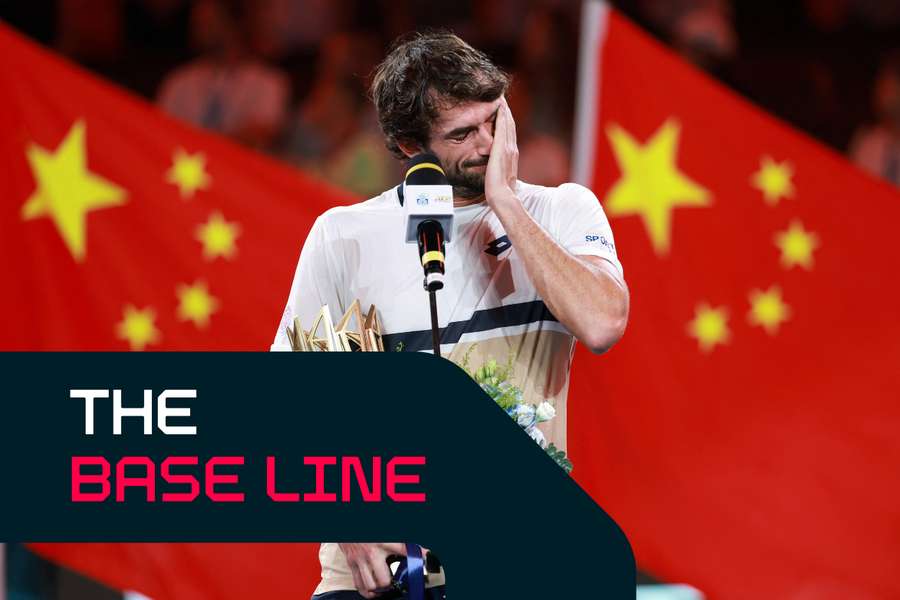 Vacherot reacts with his winner's trophy in Shanghai