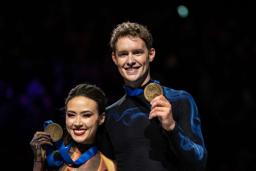 Gold medallists USA's Madison Chock and Evan Bates pose during the medals ceremony