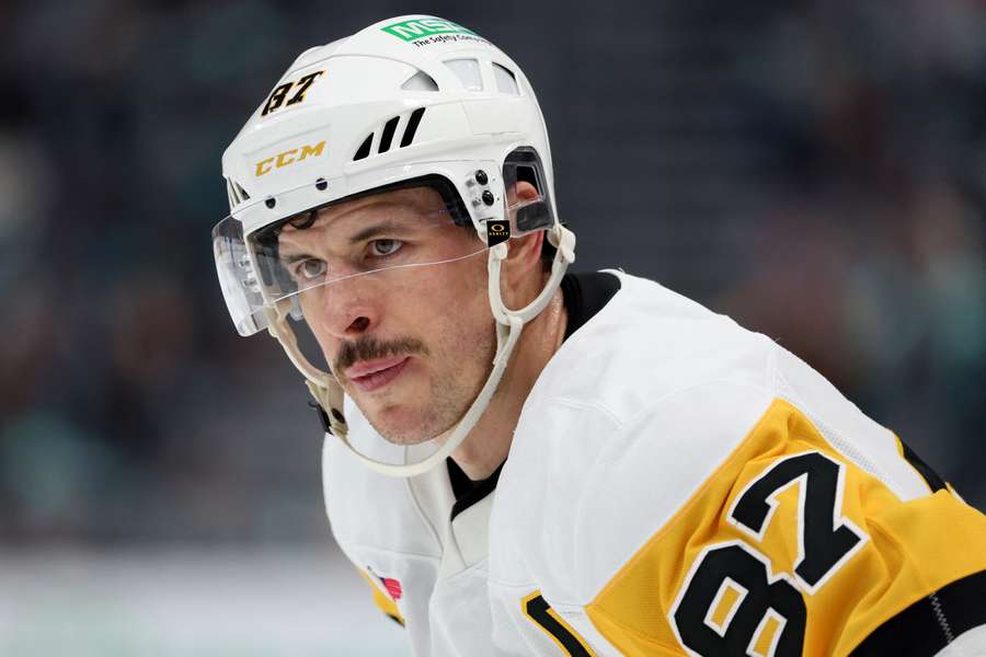 Penguins star Sidney Crosby looks on during a break (2025)