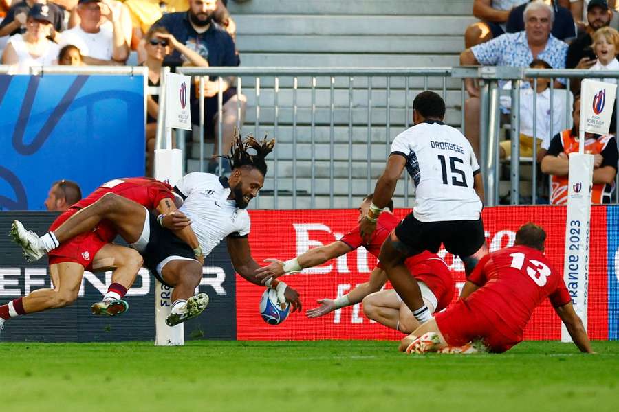 Fiji's Waisea Nayacalevu touches down for a try against Georgia