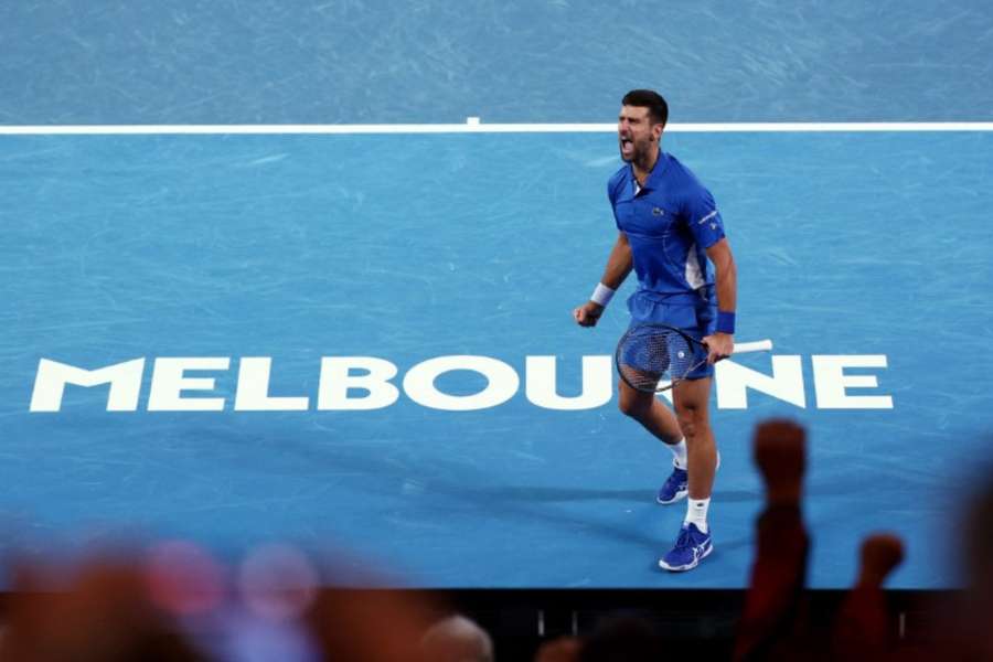 Novak Djokovic roars at the crowd during his second round match