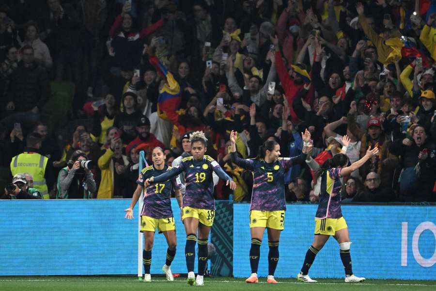 Colombia's players celebrate against Jamaica