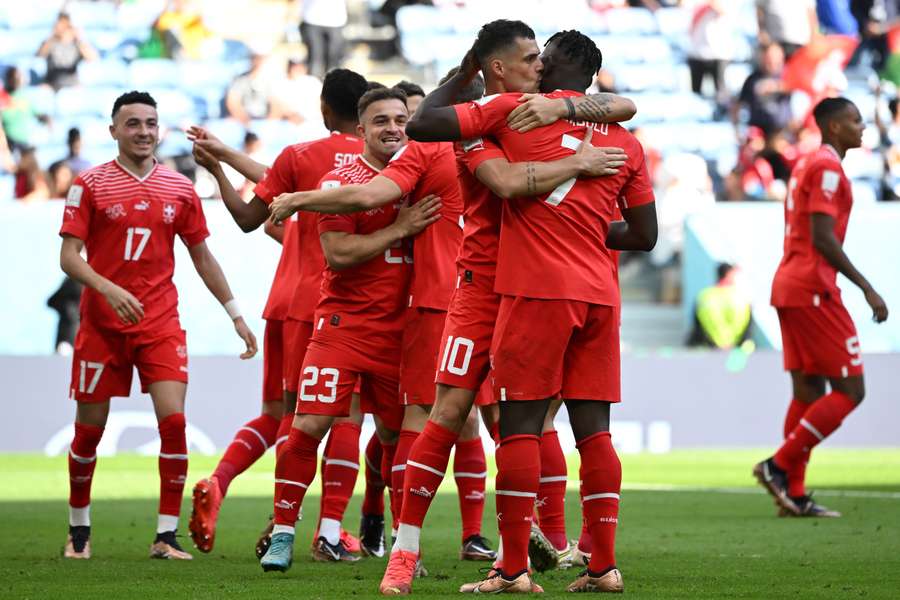 Breel Embolo celebrates with Switzerland's midfielder Granit Xhaka