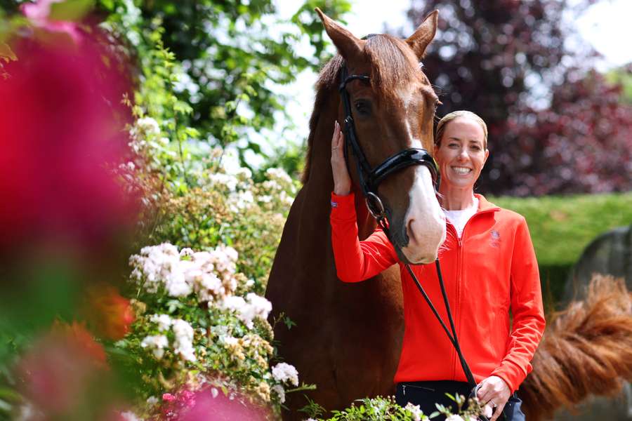 Charlotte Dujardin poses with her horse Pete (Imhotep) during a Team GB Paris 2024 Olympic Games equestrian team announcement