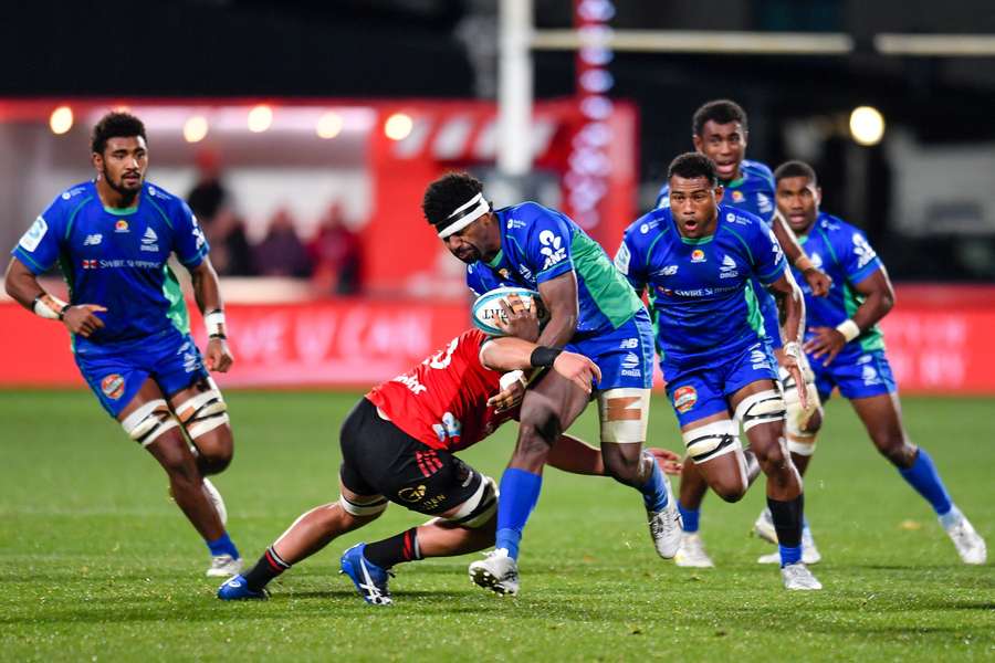 The Crusaders finished with 13 men but managed to get over the line against Fijian Drua