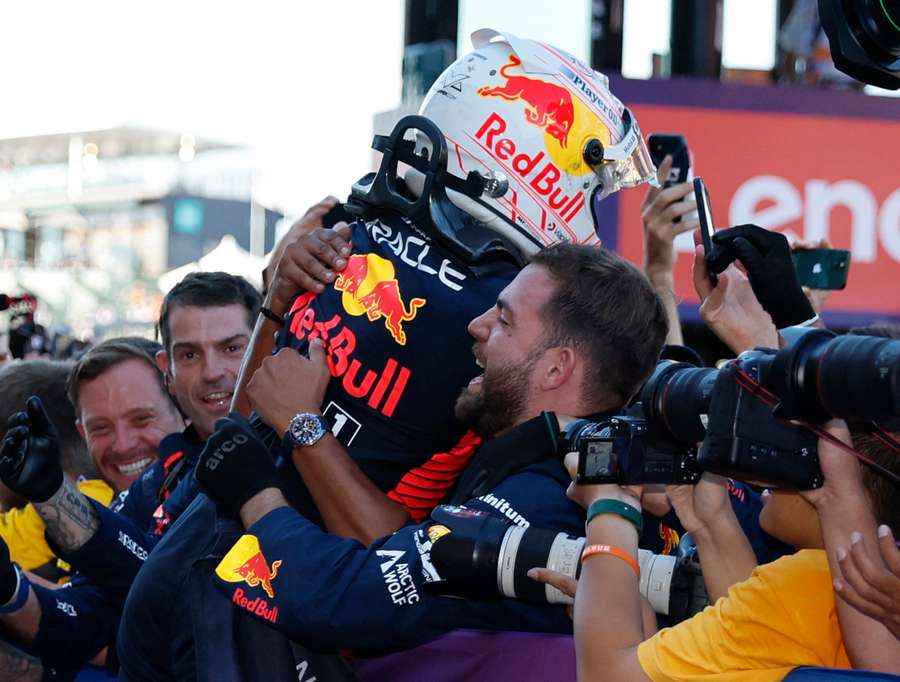 Verstappen celebrating with his team