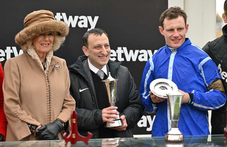 Britain's Camilla, Queen Consort (L) poses with owner Tony Bloom and jockey Paul Townend