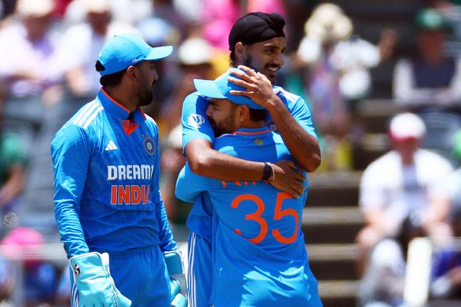India celebrate Arshdeep's five-wicket haul