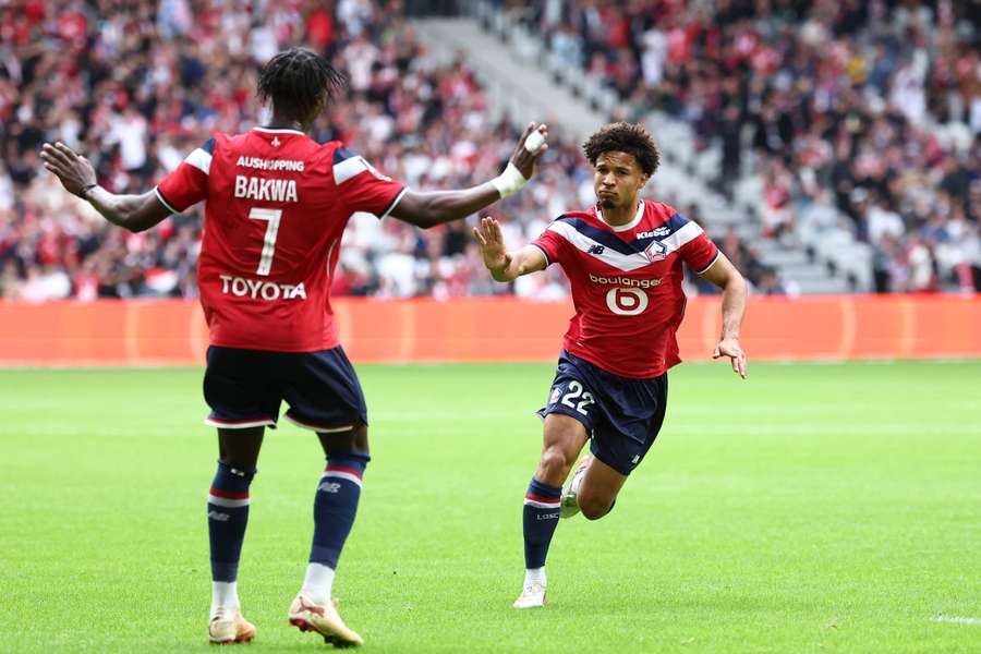 Tiago Santos (right) celebrates scoring for Lille Tiago Santos (right) celebrates scoring for Lille