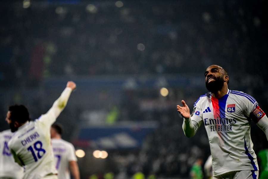 Captain Lacazette celebrates goal 