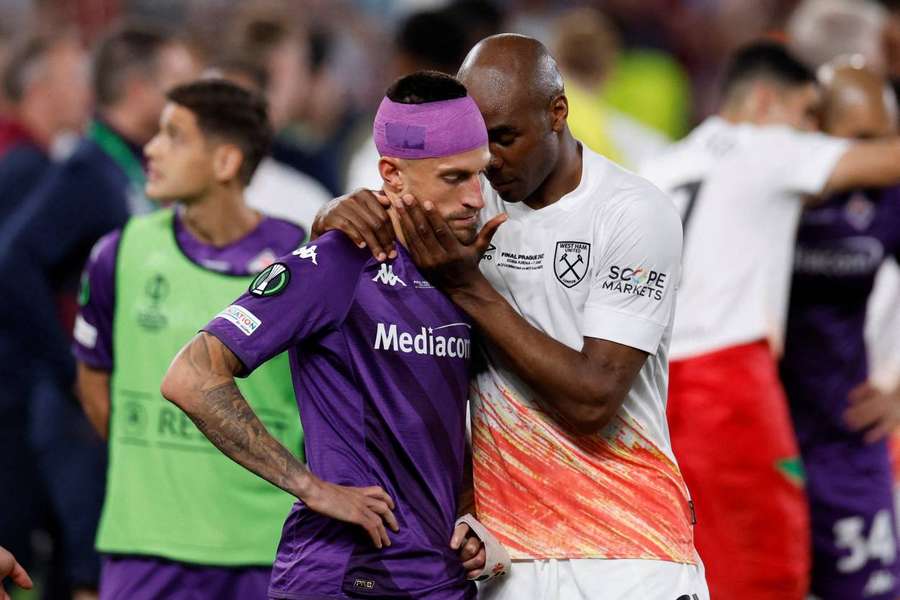 West Ham and Italian defender Ogbonna comforting compatriot Biraghi 