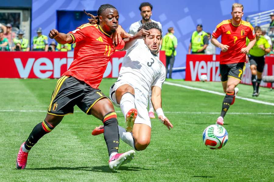 Belgium midfielder Jeremy Doku (left) and Egypt defender Mohamed Hany battle for the ball