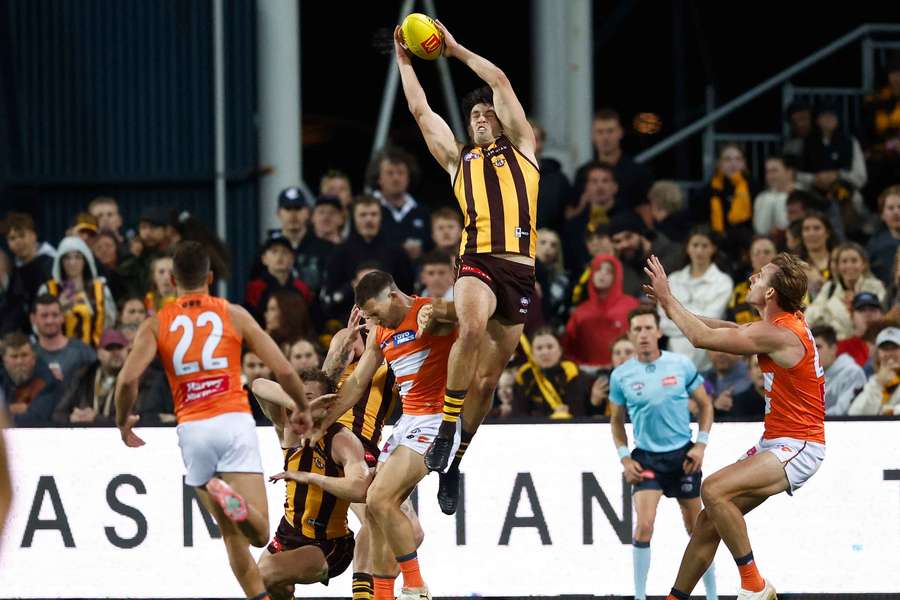 Key Hawthorn defender Tom Barrass returns to the fullback position in a big boost to the Hawks' winning chances.