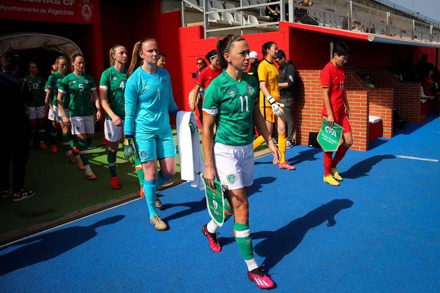 Ireland's Katie McCabe leads out her team earlier this month