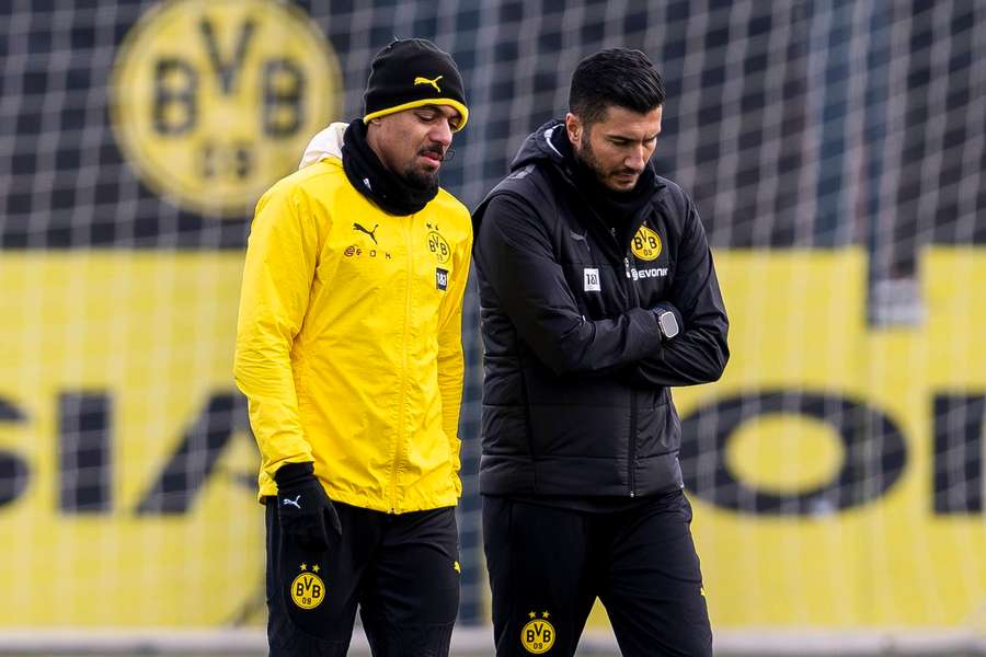 Sahin com Malen, que quer deixar o clube