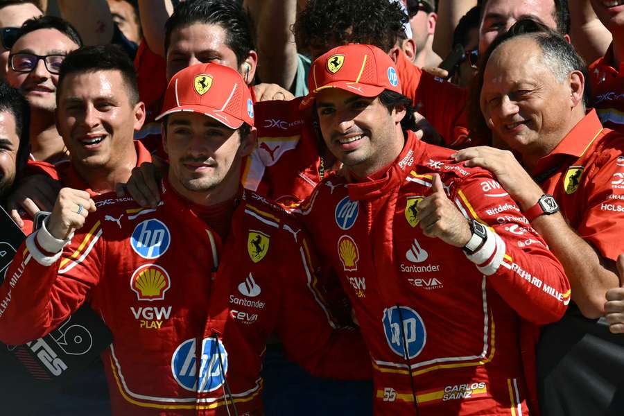 Charles Leclerc with Ferrari team-mate Carlos Sainz Jr after the race