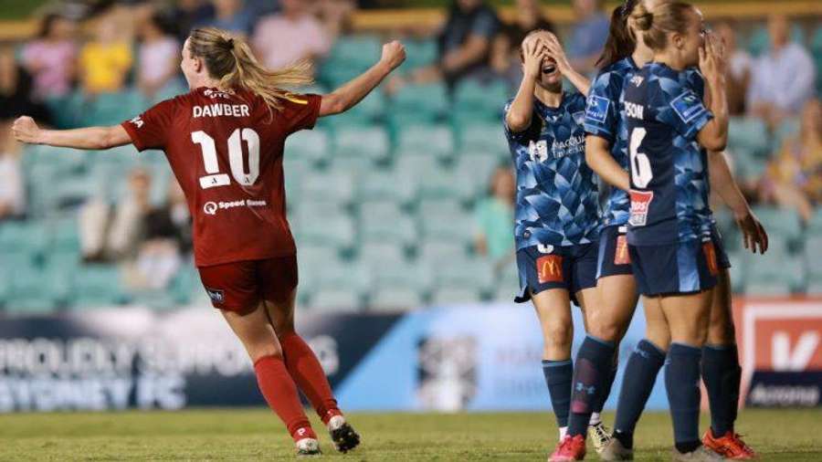 Chelsea Dawber (#10) turns to celebrate a last second goal to defeat Sydney FC Chelsea Dawber (#10) turns to celebrate a last second goal to defeat Sydney FC