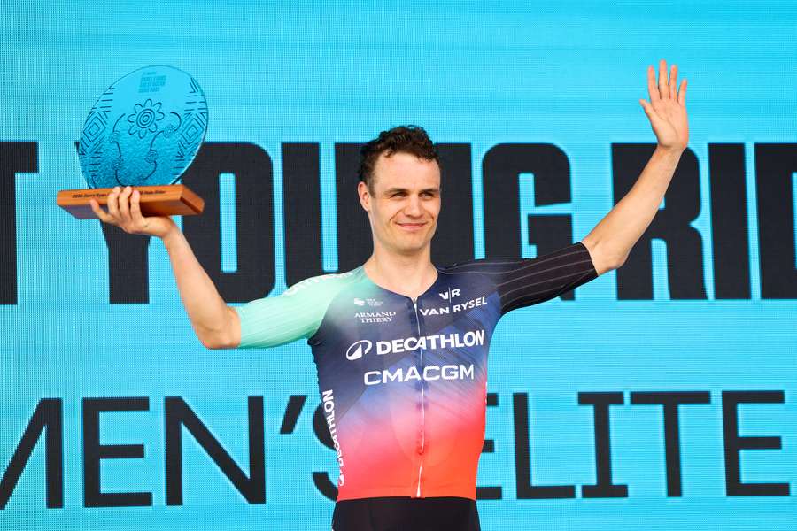 Denmark's Tobias Lund Andresen celebrates with the Cadel Evans Road Race trophy. Denmark's Tobias Lund Andresen celebrates with the Cadel Evans Road Race trophy.