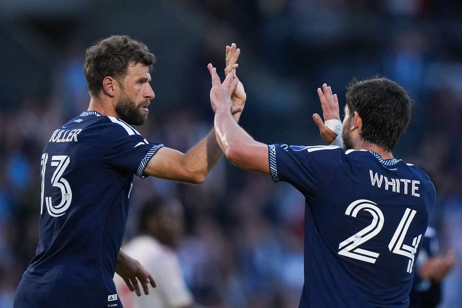 The Vancouver Whitecaps celebrate one of their goals during the Canadian Championship. The Vancouver Whitecaps celebrate one of their goals during the Canadian Championship.