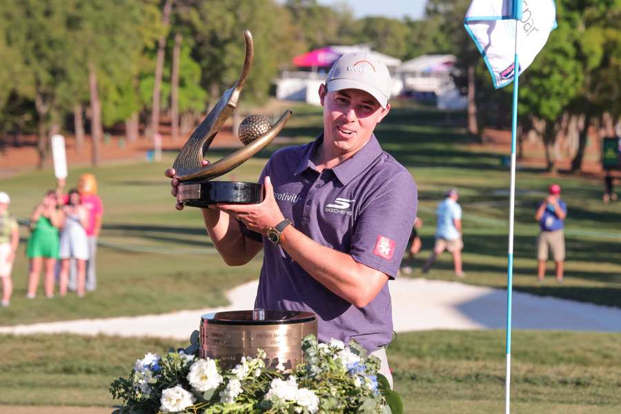 England's Matt Fitzpatrick lifts the trophy at the Valspar Championship